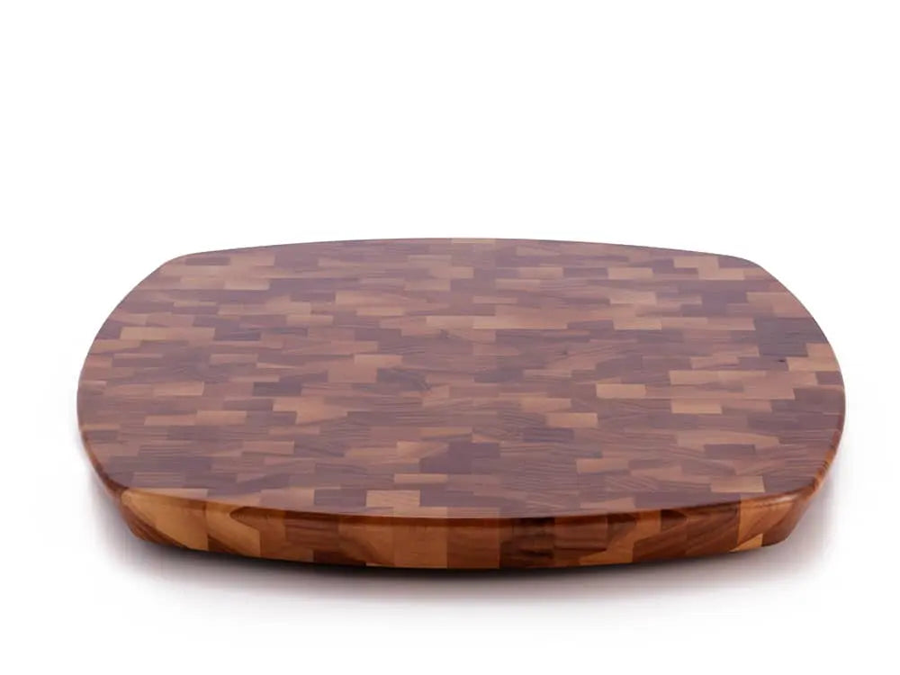 Top view of a rectangular end-grain lazy susan with rounded corners, featuring a geometric mosaic pattern in various shades of Black Walnut wood, on a white background