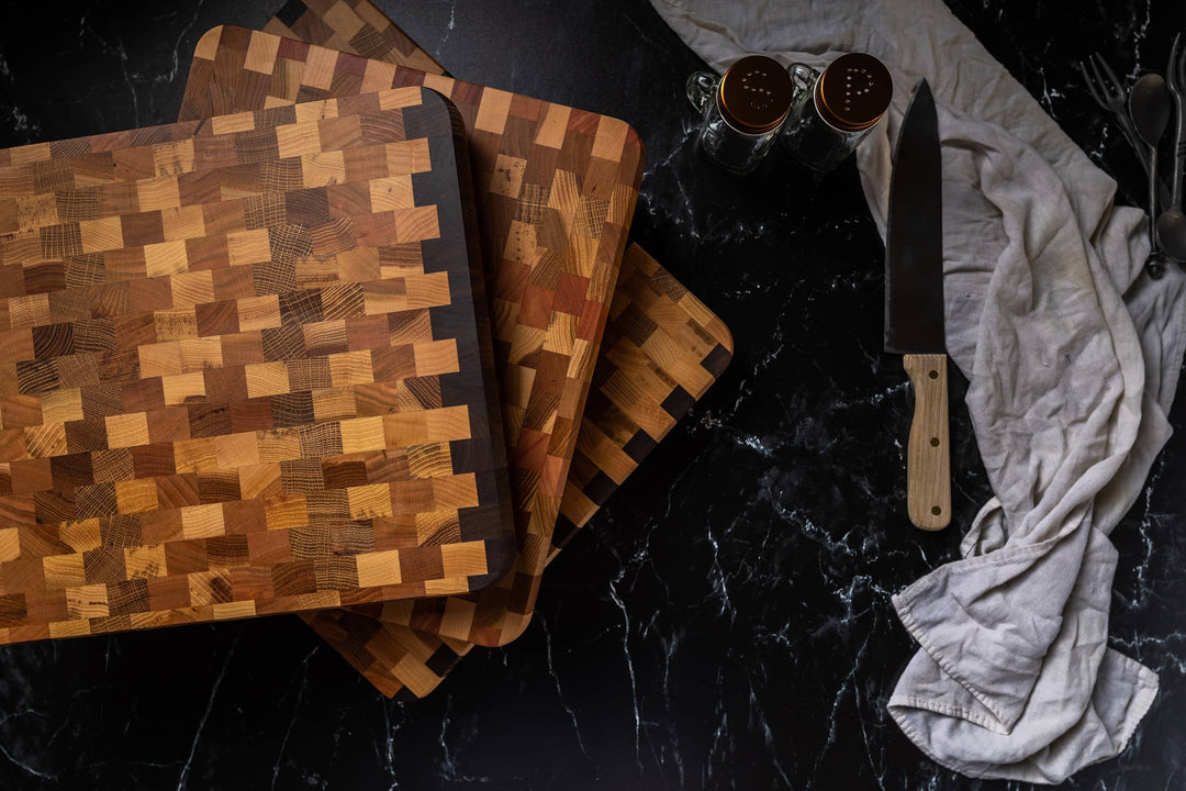 An image of three stacked cutting boards