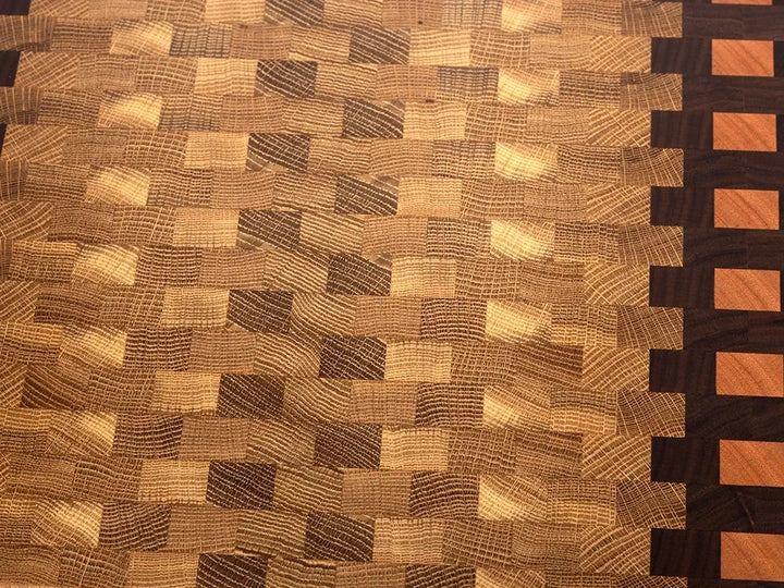 Close-up of end grain cutting board showing natural wood grain texture and diagonal checkerboard pattern